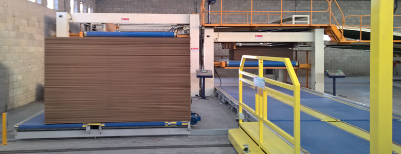 Corrugated machine down stacker connect to conveyer system
